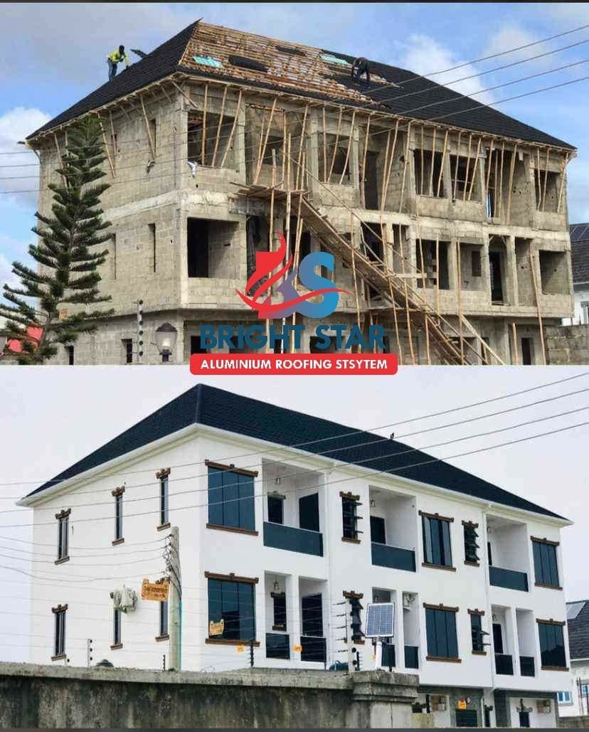 Duplex with a new black stone-coated roof